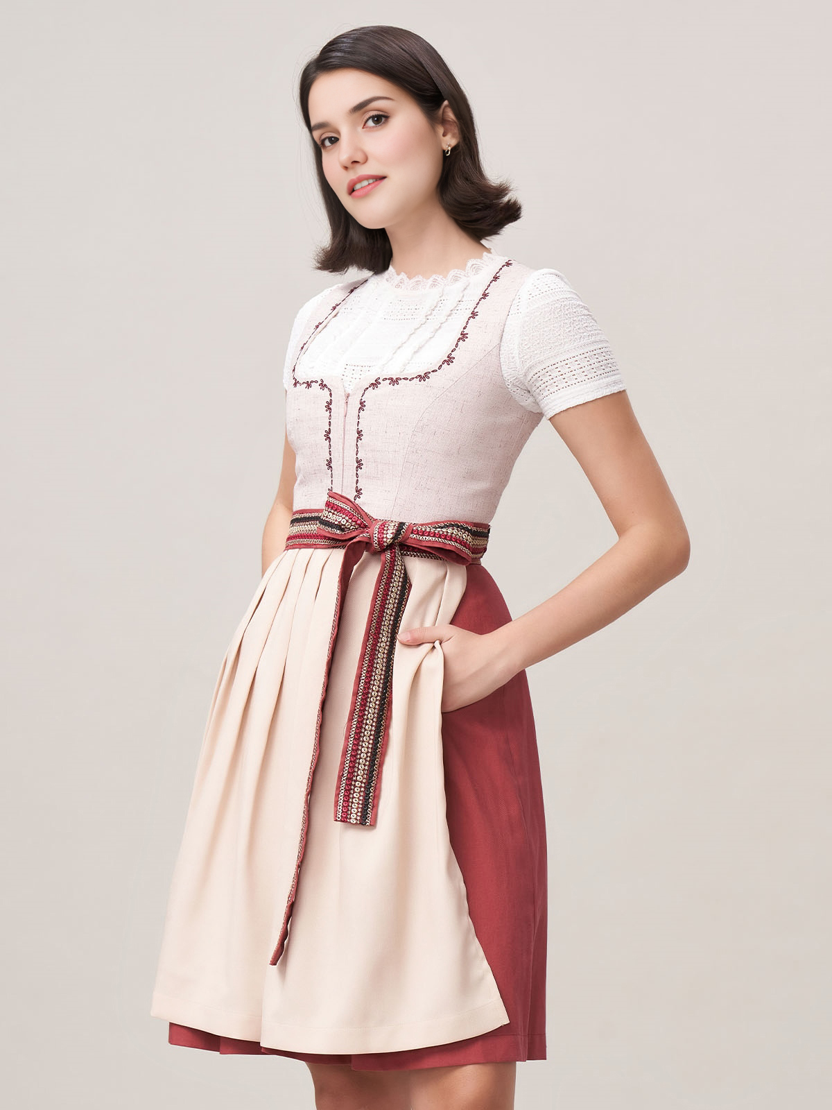 Ein samtdunkelblaues Dirndl mit rosa Bluse – perfekt für festliche Anlässe